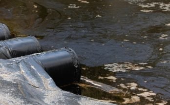 Polluted water leaking into a river